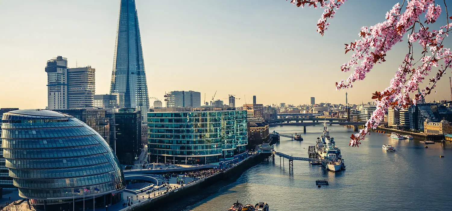 London skyline with the Shard and City Hall over the River Thames in spring