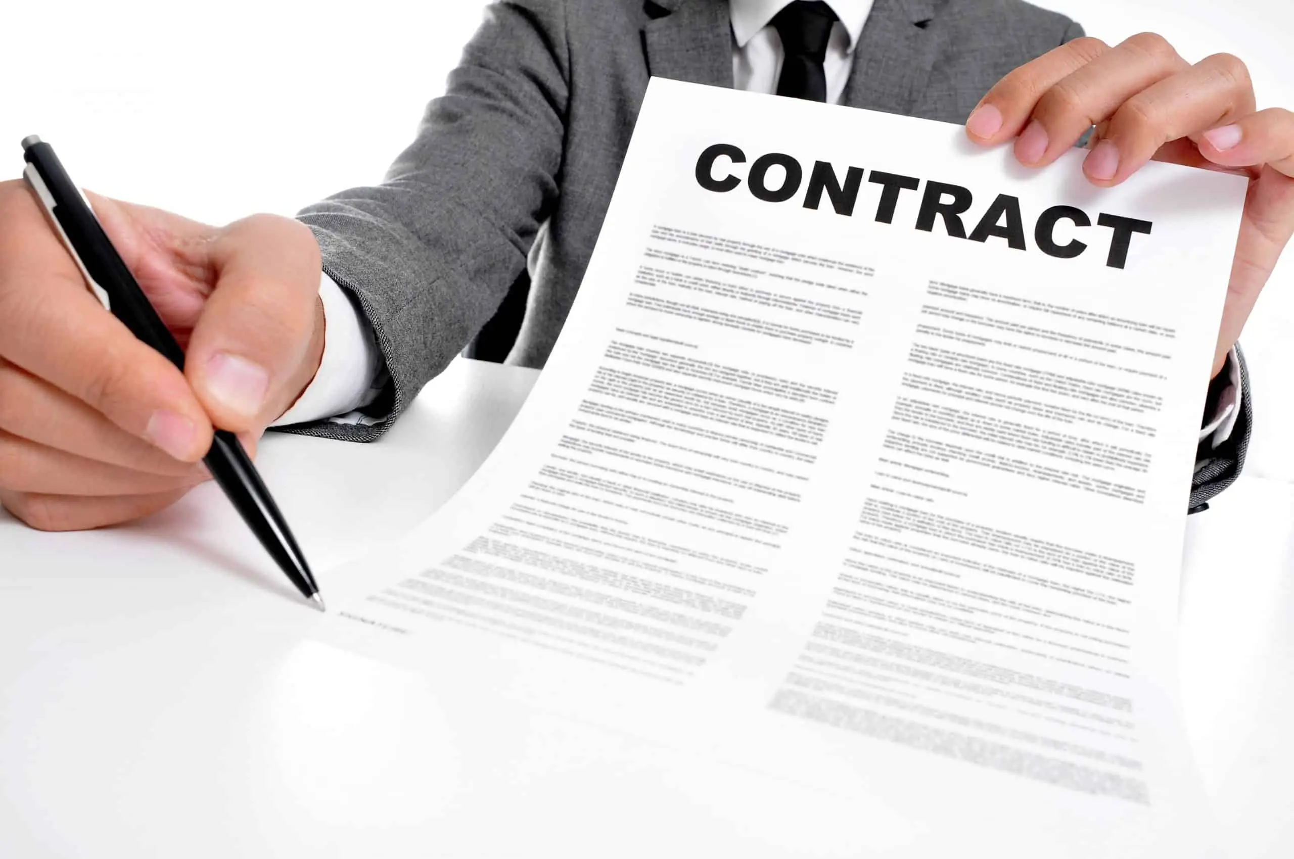 Employer reviewing restrictive covenant clauses in an employment contract